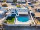 Aerial view of a house with a pool and backyard, surrounded by other homes at 7432 E Latham St, Scottsdale, AZ 85257