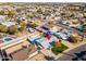 Aerial view of a home with a pool in a suburban neighborhood at 7432 E Latham St, Scottsdale, AZ 85257