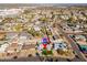 Bird's-eye view of a house with a pool, located in a quiet neighborhood at 7432 E Latham St, Scottsdale, AZ 85257