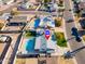 An aerial view showing a house with a pool and a large backyard in a residential setting at 7432 E Latham St, Scottsdale, AZ 85257