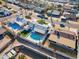 An aerial view of a single-Gathering home with a pool, and a large backyard at 7432 E Latham St, Scottsdale, AZ 85257