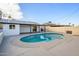 Inviting kidney-shaped pool with ample patio space at 7432 E Latham St, Scottsdale, AZ 85257