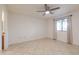 Bedroom with tile flooring and ceiling fan at 8020 E Keats Ave # 327, Mesa, AZ 85209