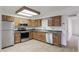 Modern kitchen with stainless steel appliances and wood cabinetry at 8020 E Keats Ave # 327, Mesa, AZ 85209