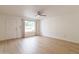 Bright living room with light vinyl flooring and ceiling fan at 8020 E Keats Ave # 327, Mesa, AZ 85209