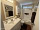 Bathroom with white vanity, bathtub, and tile floor at 8103 E Southern Ave # 52, Mesa, AZ 85209