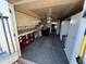 Workshop with cabinets, storage, and access to backyard at 8103 E Southern Ave # 52, Mesa, AZ 85209