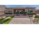 View of backyard with patio, artificial turf, and plants at 8202 W Merriweather Way, Florence, AZ 85132