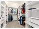 Large walk-in closet with ample shelving and hanging space at 8202 W Merriweather Way, Florence, AZ 85132