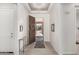 Bright and spacious entryway with wood-look flooring at 8202 W Merriweather Way, Florence, AZ 85132