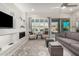 Living room with fireplace and comfortable seating at 8202 W Merriweather Way, Florence, AZ 85132