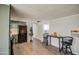 Cozy kitchen features gray cabinets, black appliances, and wood-look flooring at 9310 E Main St # 182, Mesa, AZ 85207