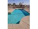 Community swimming pool with surrounding patio furniture at 9310 E Main St # 182, Mesa, AZ 85207