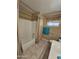 Clean bathroom with shower/tub and updated fixtures at 9600 E Balancing Rock Rd, Scottsdale, AZ 85262