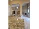 Kitchen counter offers a view into Gathering room with fireplace at 9600 E Balancing Rock Rd, Scottsdale, AZ 85262