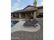 Relaxing backyard oasis with a sparkling pool and lounge chairs at 9600 E Balancing Rock Rd, Scottsdale, AZ 85262