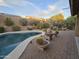 Backyard features a kidney shaped pool, fountain, and drought-tolerant landscaping at 9600 E Balancing Rock Rd, Scottsdale, AZ 85262