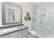 Modern bathroom with gray vanity and a large walk-in shower at 9630 E Mountain Spring Rd, Scottsdale, AZ 85255