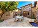 Charming courtyard with dining area and tranquil fountain at 9630 E Mountain Spring Rd, Scottsdale, AZ 85255