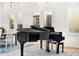 Elegant living room with a black grand piano at 9630 E Mountain Spring Rd, Scottsdale, AZ 85255