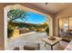 Spacious patio offers views of the pool and outdoor kitchen at 9630 E Mountain Spring Rd, Scottsdale, AZ 85255