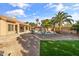 Spacious backyard with a pool, spa, and artificial turf at 1007 W Armstrong Way, Chandler, AZ 85286