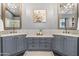 Spa-like bathroom with dual vanities and large mirrors at 1007 W Armstrong Way, Chandler, AZ 85286