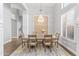 Formal dining room with a chandelier and large windows at 1007 W Armstrong Way, Chandler, AZ 85286