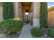 Elegant entryway with double doors and landscaping at 1007 W Armstrong Way, Chandler, AZ 85286