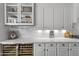 Modern kitchen featuring white shaker cabinets and a wine fridge at 1007 W Armstrong Way, Chandler, AZ 85286