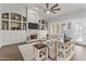 Spacious living room featuring a fireplace and built-in shelving units at 1007 W Armstrong Way, Chandler, AZ 85286