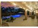 Relaxing covered patio overlooking the pool and spa at 1007 W Armstrong Way, Chandler, AZ 85286