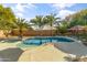 Inviting kidney shaped pool and spa with surrounding patio at 1007 W Armstrong Way, Chandler, AZ 85286