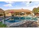 Relaxing backyard with a large pool, spa, and patio furniture at 1007 W Armstrong Way, Chandler, AZ 85286