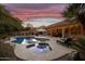 Relaxing pool area with spa, lounge chairs, and sunset views at 1007 W Armstrong Way, Chandler, AZ 85286