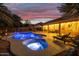 Inviting pool and spa area with patio furniture and string lights at 1007 W Armstrong Way, Chandler, AZ 85286