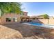 Home with sparkling pool and spacious backyard at 10116 W Luxton Ln, Tolleson, AZ 85353