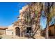 Two-story house with Spanish-style architecture, featuring a large garage and landscaped front yard at 10116 W Luxton Ln, Tolleson, AZ 85353