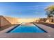 Relaxing backyard oasis with refreshing pool at 10116 W Luxton Ln, Tolleson, AZ 85353