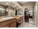 Double-sink bathroom with granite countertops and a large shower at 10329 E Sunridge Dr, Sun Lakes, AZ 85248