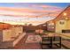 Cozy backyard patio with fire pit and seating area at 10709 E Thornton Ave, Mesa, AZ 85212