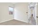 Bright bedroom with neutral walls and carpet flooring at 10709 E Thornton Ave, Mesa, AZ 85212