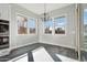 Breakfast nook with modern light fixture and white cabinetry at 10709 E Thornton Ave, Mesa, AZ 85212