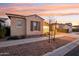 Two-story home with a two-car garage and desert landscaping at 10709 E Thornton Ave, Mesa, AZ 85212