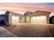 Two-car garage and inviting curb appeal at 10709 E Thornton Ave, Mesa, AZ 85212