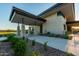 Community clubhouse with covered entryway and landscaping at 10709 E Thornton Ave, Mesa, AZ 85212