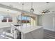 Modern kitchen island with white quartz countertop at 10709 E Thornton Ave, Mesa, AZ 85212