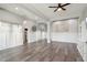 Bright and airy living room with hardwood floors and recessed lighting at 10709 E Thornton Ave, Mesa, AZ 85212