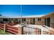 Private patio with wrought iron gate and seating area at 10742 W Cheryl Dr, Sun City, AZ 85351