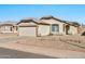 Charming one-story home with a two-car garage and well-maintained landscaping at 10932 W Morten Ave, Glendale, AZ 85307